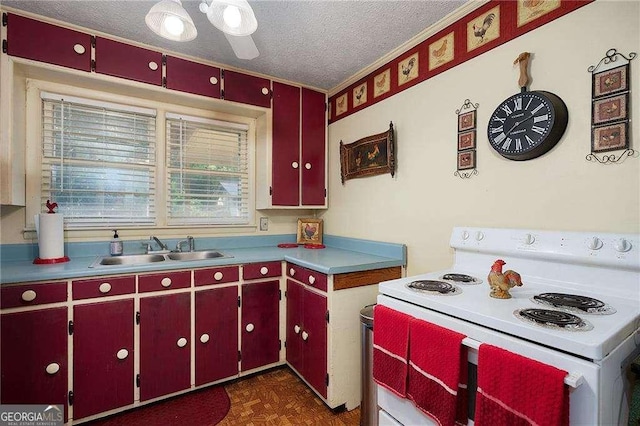 413 New Town Rd NE, Calhoun, GA 30701 - kitchen with white electric range oven, red cabinets, a textured ceiling, and light countertops
