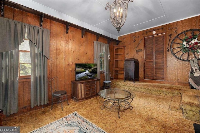 413 New Town Rd NE, Calhoun, GA 30701 - unfurnished living room featuring wooden walls and a chandelier