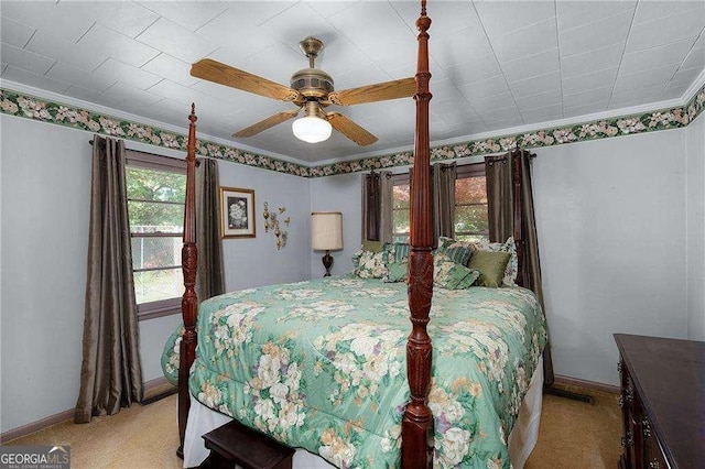 413 New Town Rd NE, Calhoun, GA 30701 - bedroom with crown molding, baseboards, ceiling fan, and light carpet
