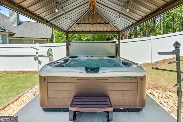 58 Gables Way, Newnan, GA 30265 - view of patio / terrace featuring fence, a hot tub, and a gazebo