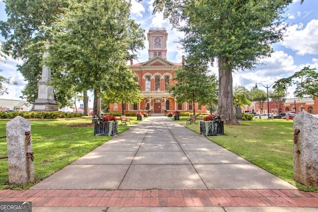 surrounding community with a yard