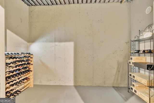 wine room featuring concrete floors