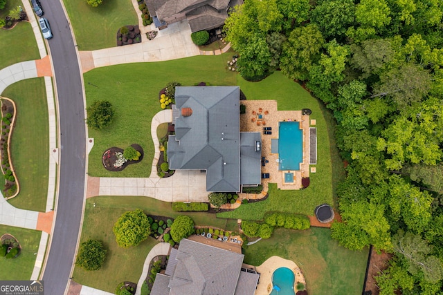 drone / aerial view of a pool area