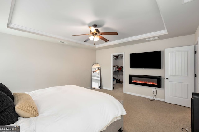 3406 Pennington Dr, Lithonia, GA 30038 - bedroom with a tray ceiling, light colored carpet, and baseboards