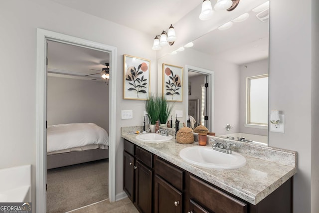 3406 Pennington Dr, Lithonia, GA 30038 - ensuite bathroom featuring double vanity and ceiling fan
