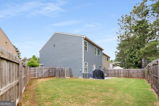 3406 Pennington Dr, Lithonia, GA 30038 - back of property with central AC and a patio area