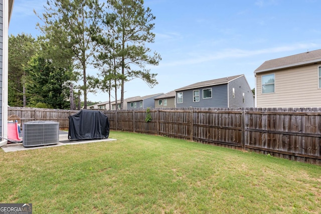 3406 Pennington Dr, Lithonia, GA 30038 - view of yard with central AC unit and a residential view