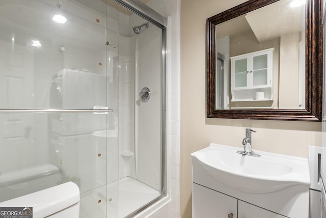 825 Yosemite Dr, Suwanee, GA 30024 - bathroom featuring toilet, a shower stall, and vanity