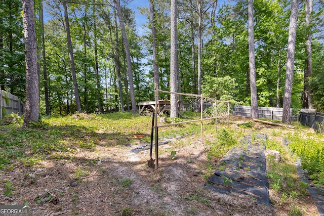 view of yard featuring fence