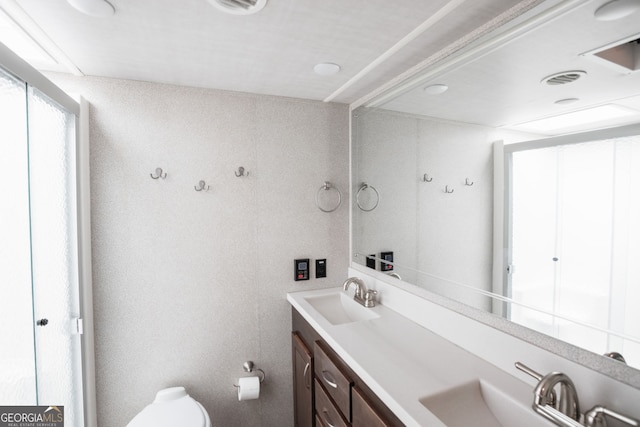 43 Tip Top Cir, Cleveland, GA 30528 - bathroom featuring toilet and double vanity