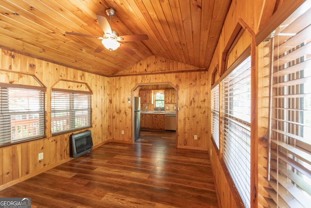 43 Tip Top Cir, Cleveland, GA 30528 - empty room with lofted ceiling, wooden walls, dark wood finished floors, heating unit, and ceiling fan