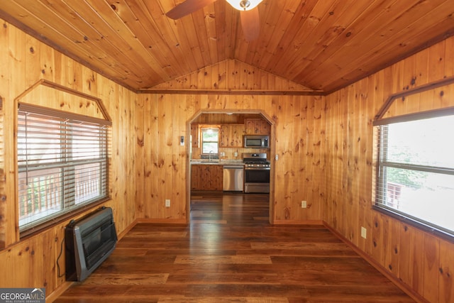 43 Tip Top Cir, Cleveland, GA 30528 - unfurnished living room with heating unit, a sink, lofted ceiling, wooden walls, and dark wood finished floors