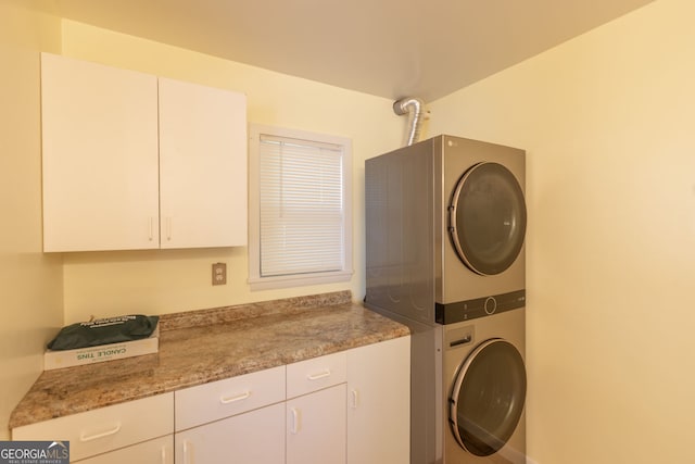 43 Tip Top Cir, Cleveland, GA 30528 - laundry area featuring stacked washing machine and dryer and cabinet space