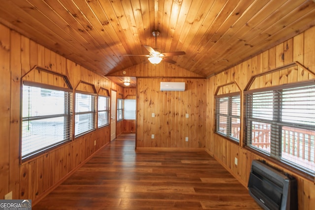 43 Tip Top Cir, Cleveland, GA 30528 - unfurnished room featuring vaulted ceiling, wood walls, an AC wall unit, ceiling fan, and wood finished floors