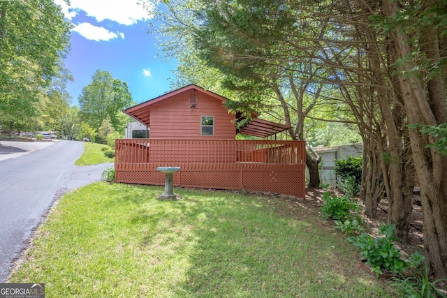 43 Tip Top Cir, Cleveland, GA 30528 - view of side of property with a wooden deck and a lawn
