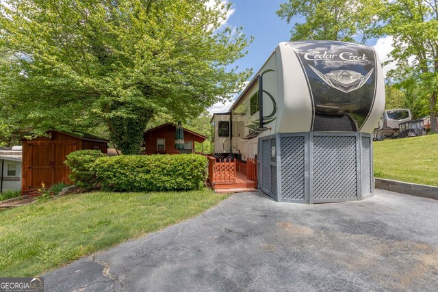 43 Tip Top Cir, Cleveland, GA 30528 - view of front of house with a front lawn
