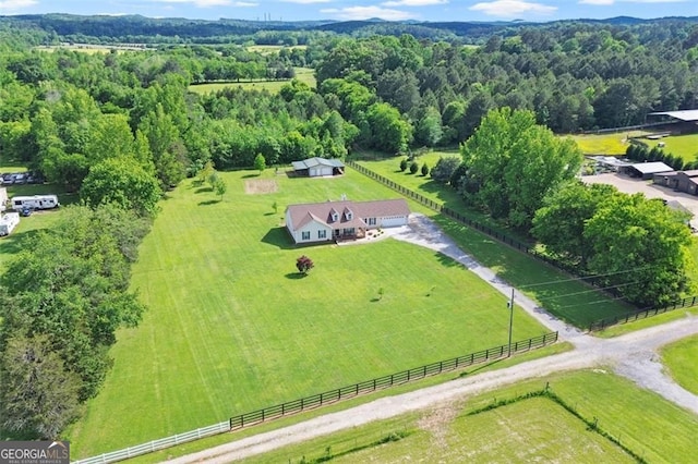overview of rural landscape with a heavily wooded area