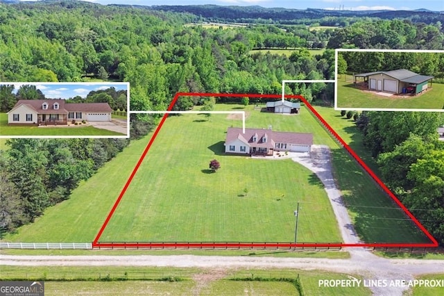 view of rural area featuring a forest and property boundaries highlighted