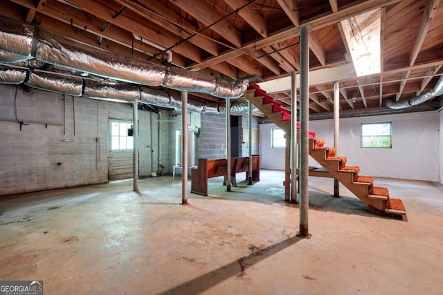 basement featuring stairs