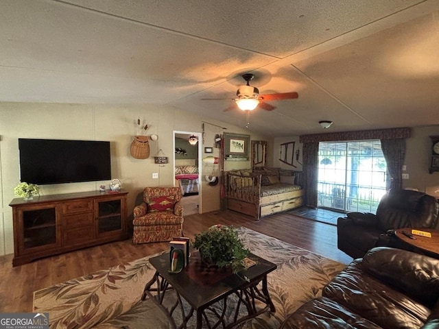317 Cedar Dr NW, Sparta, GA 31087 - living room with wood finished floors, ceiling fan, and lofted ceiling