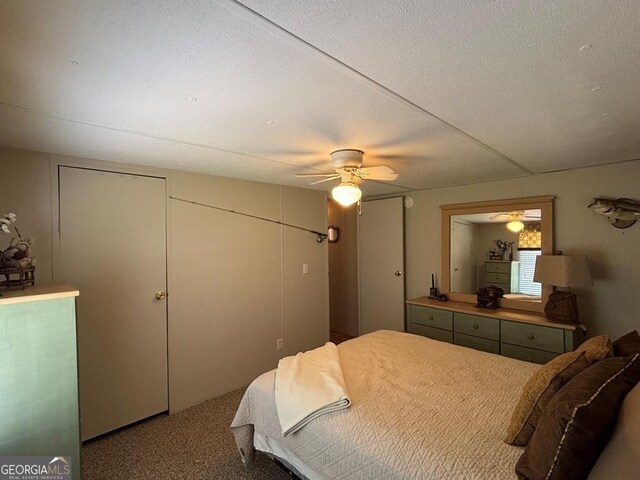 317 Cedar Dr NW, Sparta, GA 31087 - bedroom with carpet flooring and ceiling fan