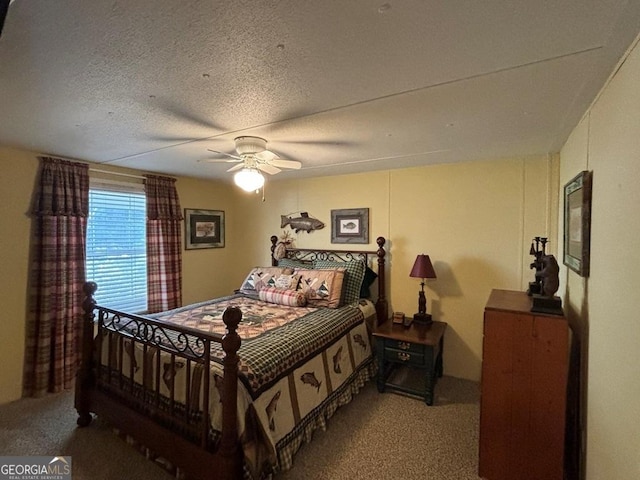 317 Cedar Dr NW, Sparta, GA 31087 - carpeted bedroom featuring ceiling fan and a textured ceiling