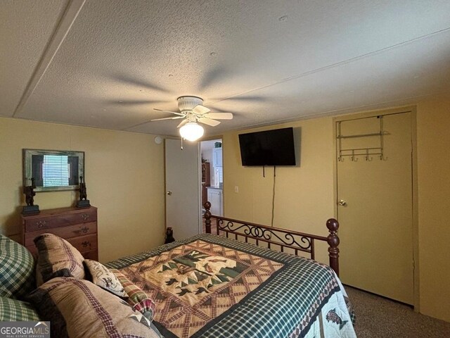 317 Cedar Dr NW, Sparta, GA 31087 - bedroom featuring a ceiling fan, a textured ceiling, and carpet flooring