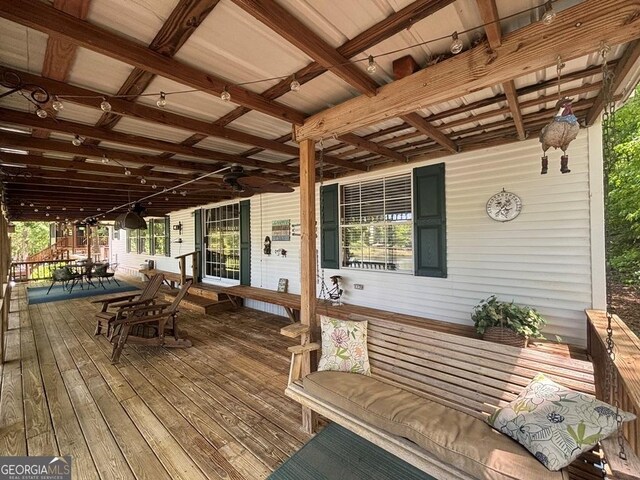 317 Cedar Dr NW, Sparta, GA 31087 - deck featuring outdoor dining space