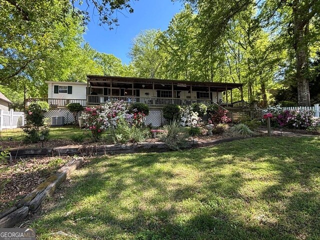 317 Cedar Dr NW, Sparta, GA 31087 - view of front of house with a deck