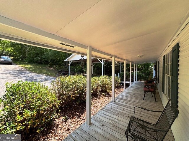 317 Cedar Dr NW, Sparta, GA 31087 - view of wooden deck