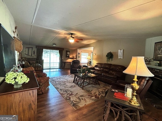 317 Cedar Dr NW, Sparta, GA 31087 - living area with wood finished floors, a ceiling fan, and lofted ceiling