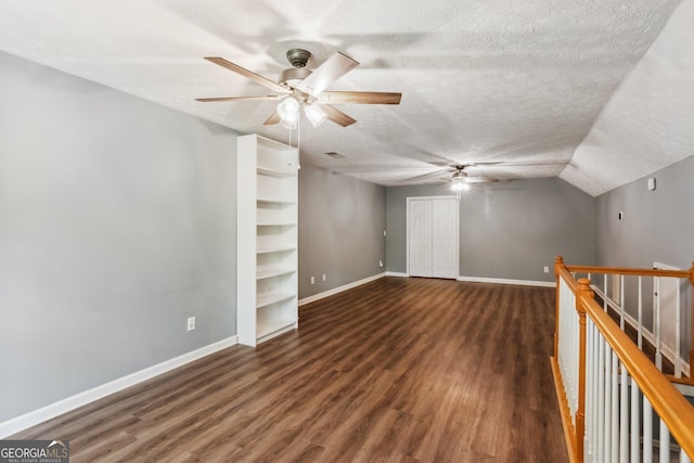 7675 Rose Ln, Cumming, GA 30040 - empty room featuring ceiling fan, wood finished floors, baseboards, and a textured ceiling