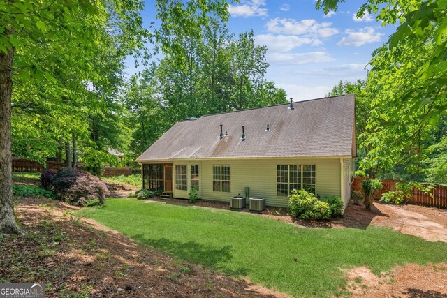 7675 Rose Ln, Cumming, GA 30040 - rear view of house with cooling unit