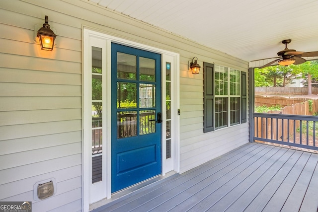 7675 Rose Ln, Cumming, GA 30040 - wooden porch with a ceiling fan