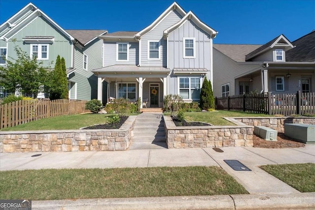 view of front of property featuring board and batten siding and a porch