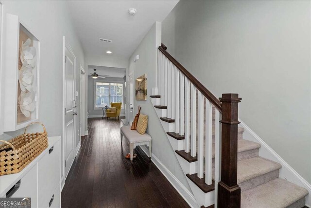 stairway with hardwood / wood-style flooring, baseboards, recessed lighting, and a ceiling fan