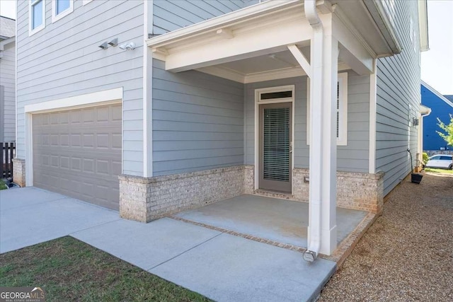 doorway to property featuring a garage
