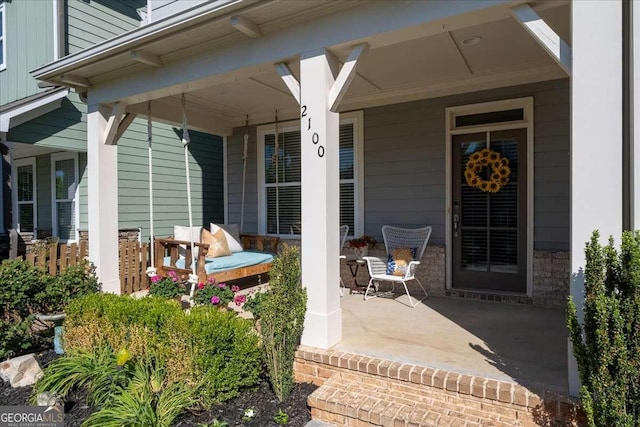 entrance to property with a porch