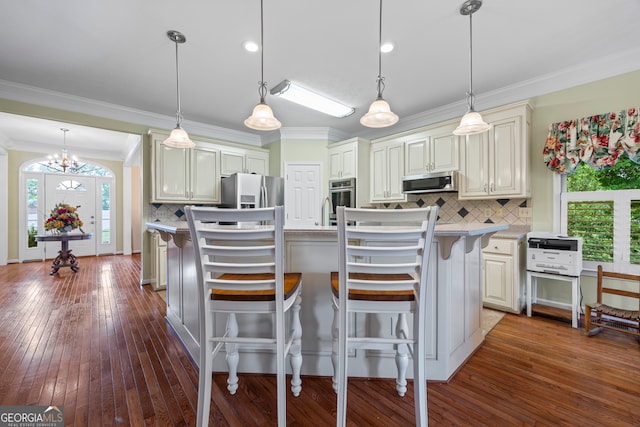kitchen with appliances with stainless steel finishes, crown molding, backsplash, dark wood-type flooring, and light countertops