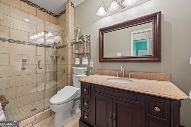 full bath with toilet, a shower stall, vanity, and tile patterned floors