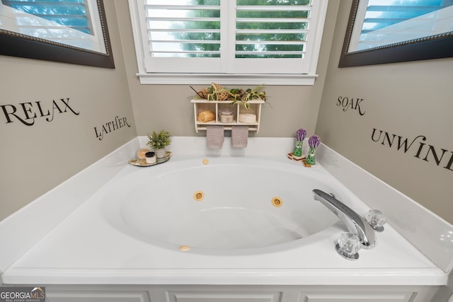 bathroom featuring a whirlpool tub
