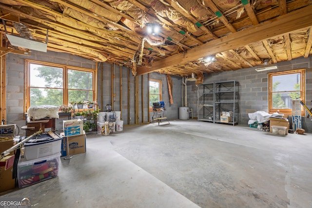 below grade area with concrete block wall