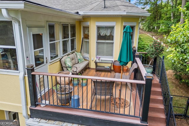 deck featuring outdoor lounge area