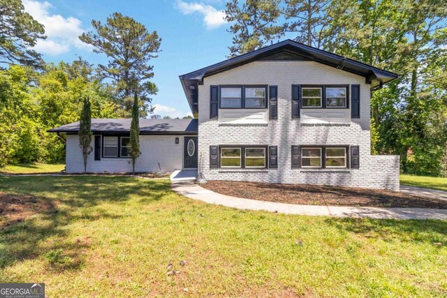 2158 Oregon Ct, Decatur, GA 30032 - view of front of home featuring brick siding and a front yard
