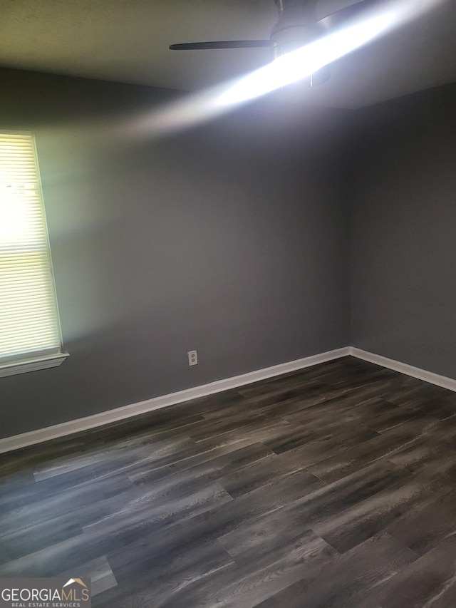 324 Cynthia Ct, Jonesboro, GA 30238 - unfurnished room with dark wood-style floors and baseboards