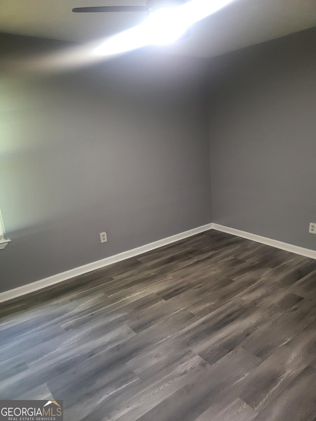 324 Cynthia Ct, Jonesboro, GA 30238 - empty room featuring baseboards and dark wood-type flooring