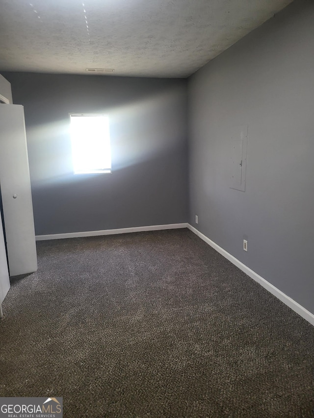 324 Cynthia Ct, Jonesboro, GA 30238 - unfurnished room with baseboards, carpet, and a textured ceiling