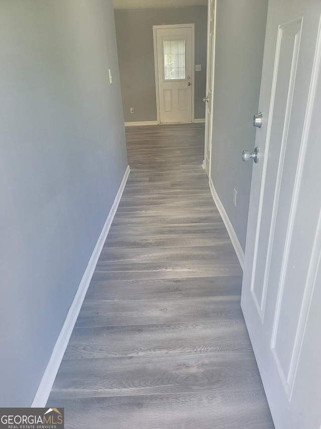 324 Cynthia Ct, Jonesboro, GA 30238 - hallway with baseboards and wood finished floors
