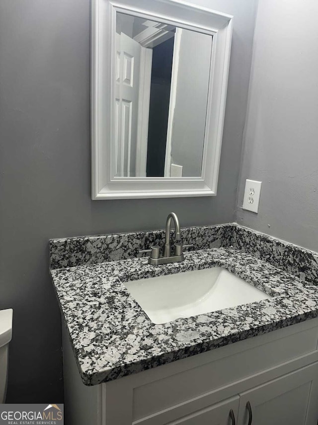 324 Cynthia Ct, Jonesboro, GA 30238 - half bath featuring vanity and toilet