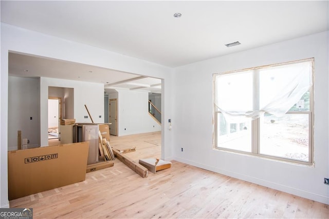 4222 Matisse Ln, Fairburn, GA 30213 - unfurnished living room featuring wood finished floors, stairway, and baseboards